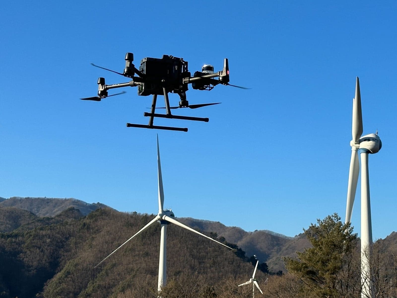 Drones twinned with predictive analytics for whole-turbine windfarm solution