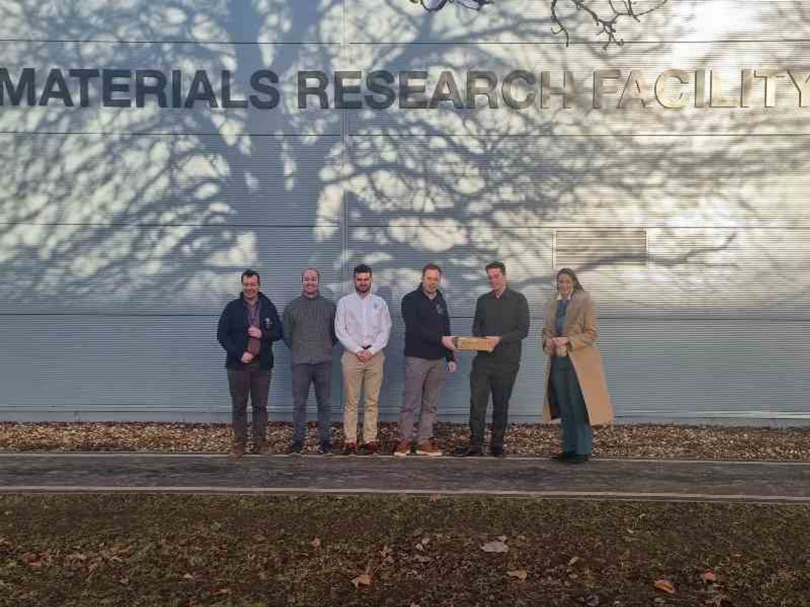 A specimen of ‘fusion grade’ silicon carbide composite made by KF in Japan, being handed over to UKAEA for experimentation. L-R: Dr Alex Leide (UKAEA), Dr Max Rigby-Bell (UKAEA), George Clark (UKAEA), Dr James Wade-Zhu (UKAEA), Andy Wilson (Kyoto Fusioneering), Vojna Ngjeqari (Kyoto Fusioneering).