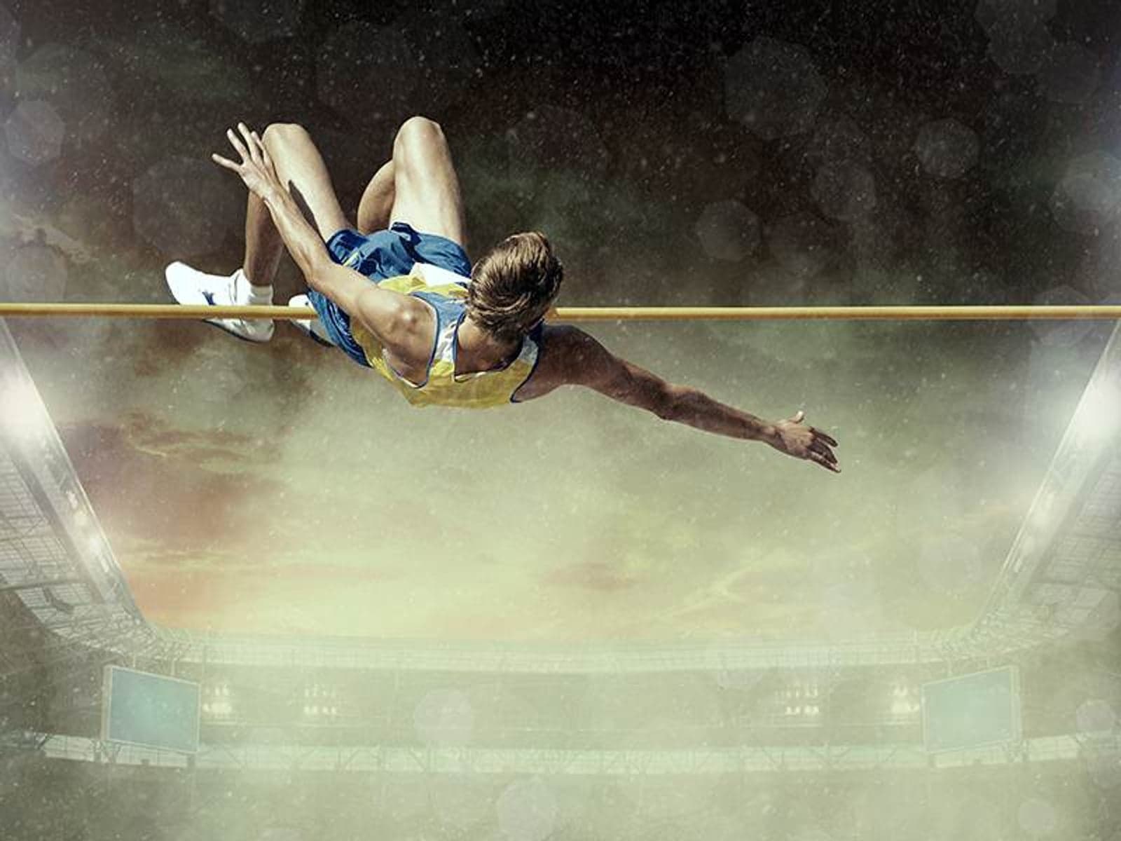 Athlete in action of high jump.